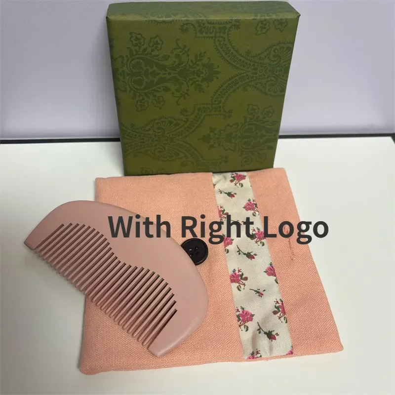 

Brand name pink mini beauty hair wood comb