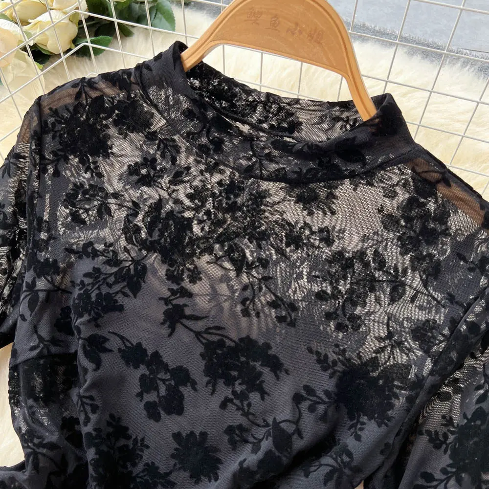 long sleeve sheer design on hanger