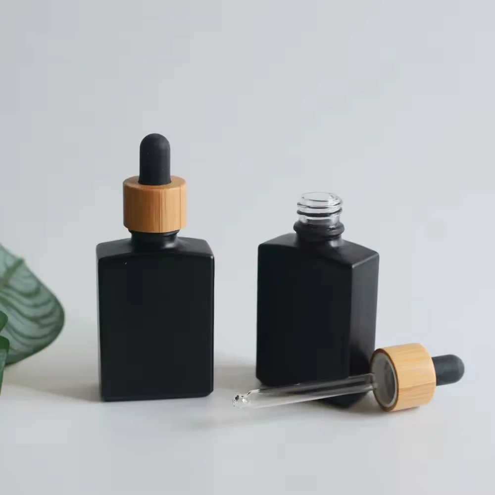 

200pcs*30ml 1OZ Hot Selling Matte Black Square Glass Dropper Bottles with Bamboo Lids for Fragrance Perfume Serum Essential Oils