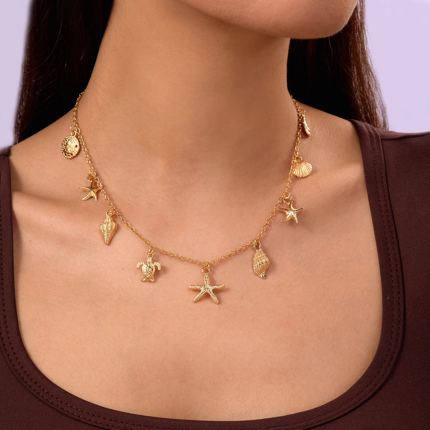 Collier bohème avec pendentif en forme d'étoile de mer 1