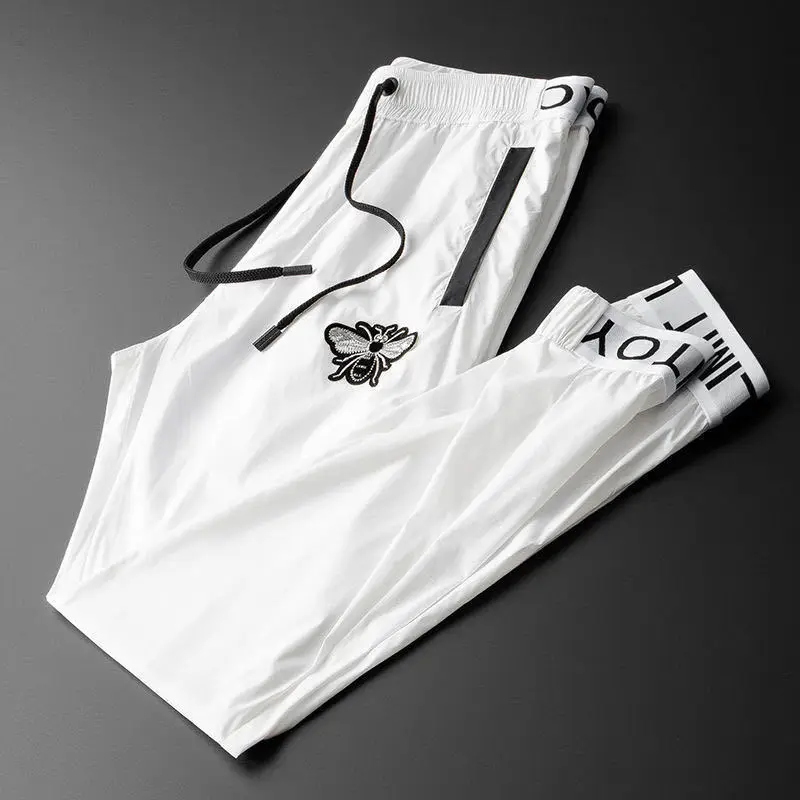 European luxury bee embroidered ice silk casual pants men's summer new high-end brand smooth and breathable sports pants