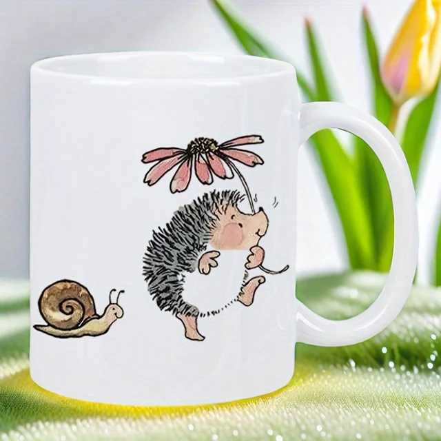Ceramic Mug with Hedgehog Sniffing Flower & Snail Accent - Cute Garden Animals Coffee Cup, Brown Hedgehog & Pink Floral Design -