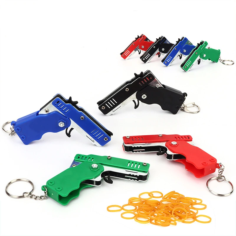 1PCS Mini keychain gun rubber band gun Toy Gun Shooting Pistol Alloy Kid Outdoor Party Folding metal gun gift boyfriend Gift