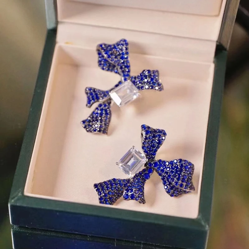 

Женские серьги из серебра 925 пробы, с голубым бантом