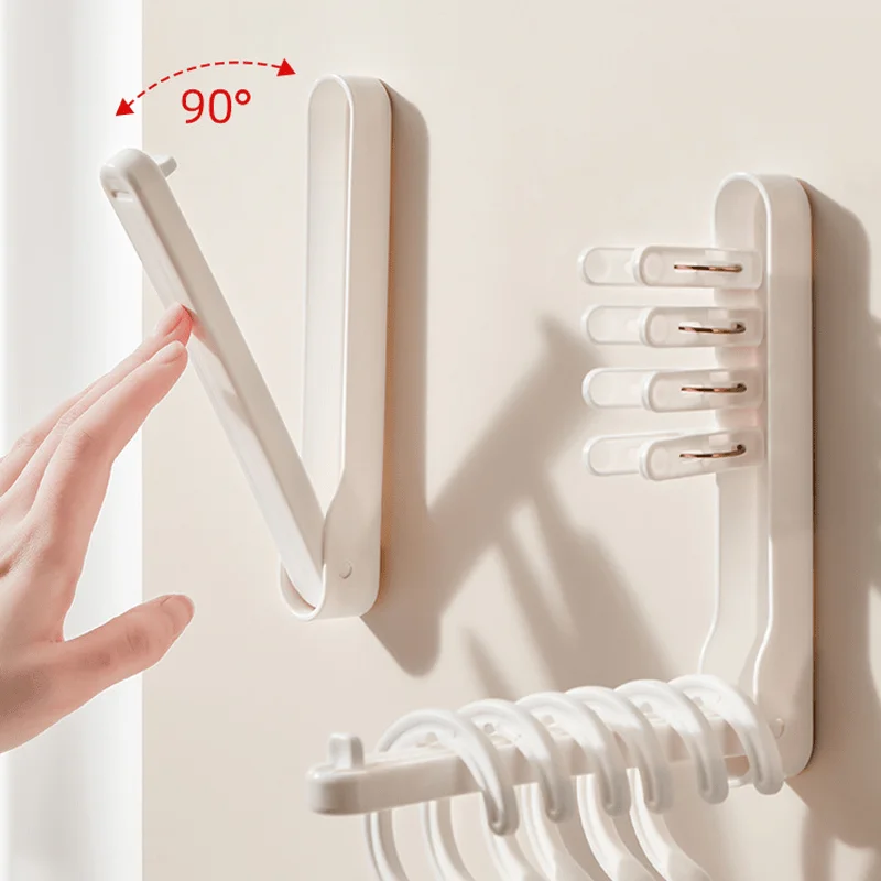1-Piece car repair tool hanger, plastic folding, wall-mounted with adhesive for garage, handy for auto shops and fans.