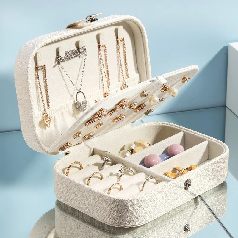 Joyero portátil de cuero con cremallera, caja organizadora de joyas, estuche de viaje para exhibición, botón de almacenamiento, 2023