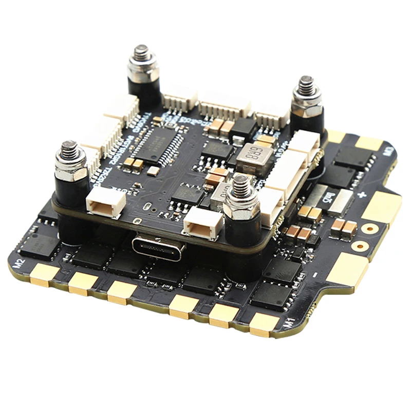 PCB du contrôleur de vol F722 et ESC 4-en-1 100A pour drone FPV avec composants électroniques détaillés.