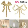 1/2Pcs Coat Hook Brass Retro Gold Bow-Shape Decorative Hook Wall-Mounted Clothes Rack for Home Bathroom Bedroom Towel Hooks 1