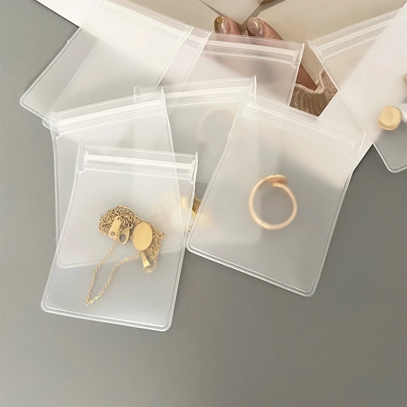100 Pieces Self-Sealing Laser Small Plastic Bags For Jewelry Pouch With  Clear Display Window Jewelry Packaging Gift Storage Bags - AliExpress