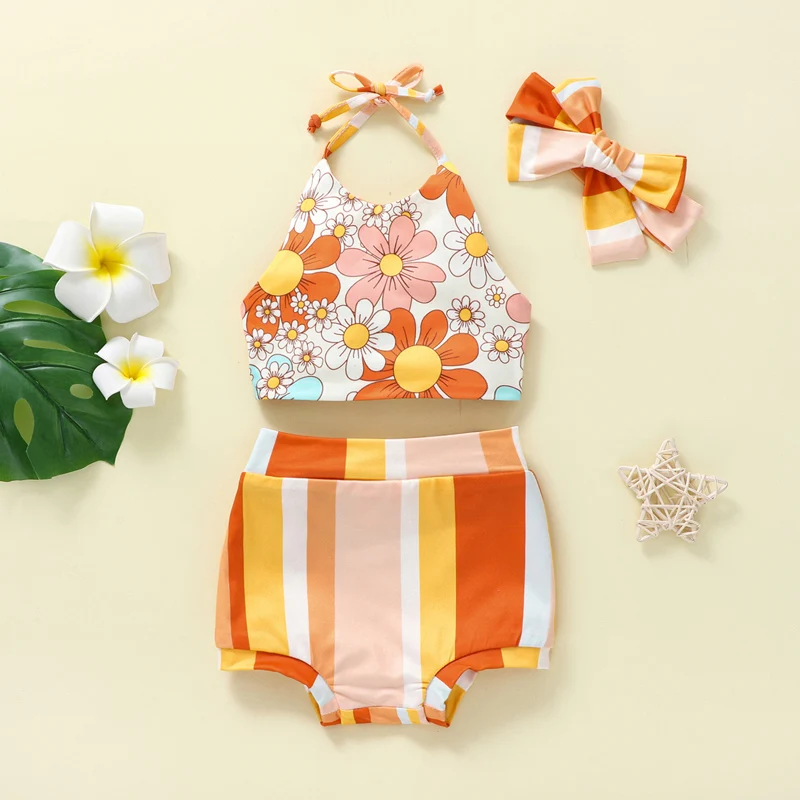 

2023-03-27 Lioraitiin 0-24M Newborn Baby Girls Summer Clothes Reversible Floral Print Halterneck Tops Rainbow Shorts Headband