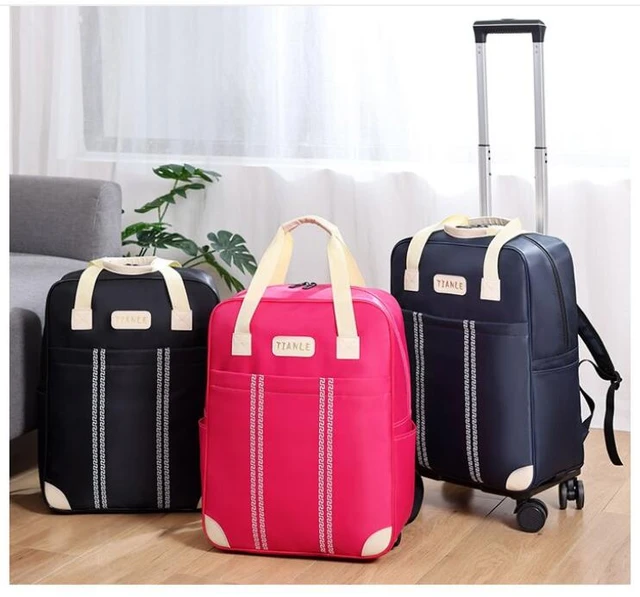 Bolso con ruedas para mujer, mochila de viaje con ruedas, organizador de  equipaje de gran capacidad, novedad - AliExpress