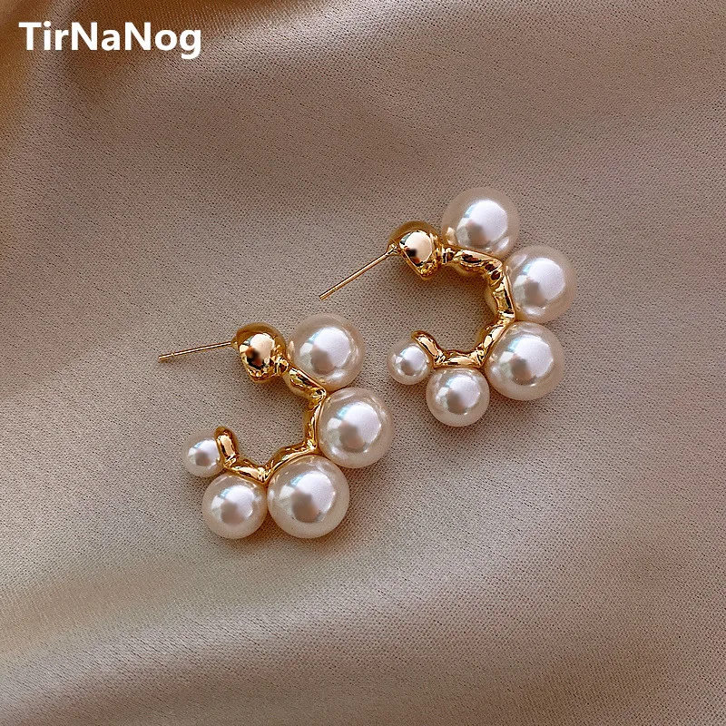 CHANEL CC Stud Earrings in Gilt Metal set with Pearl Beads. at 1stDibs