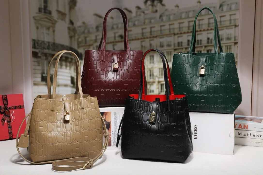 CILMI HARVILL CHHC 2023 Women's Bucket Bag New Single-shoulder Cross-body Portable Perforated Design Italic Letter Opening