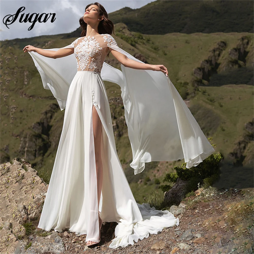 

Bohemian Chiffon Wedding Dresses With Cape 2023 A-Line Side Slit O-Neck Lace Appliques Sexy Open Back Sweep Train Bridal Gown