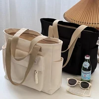 2025 mode sac à bandoulière pour femmes classe grande capacité étudiant fourre-tout nouveau toile sac à main de banlieue femmes sac Eco sac 4