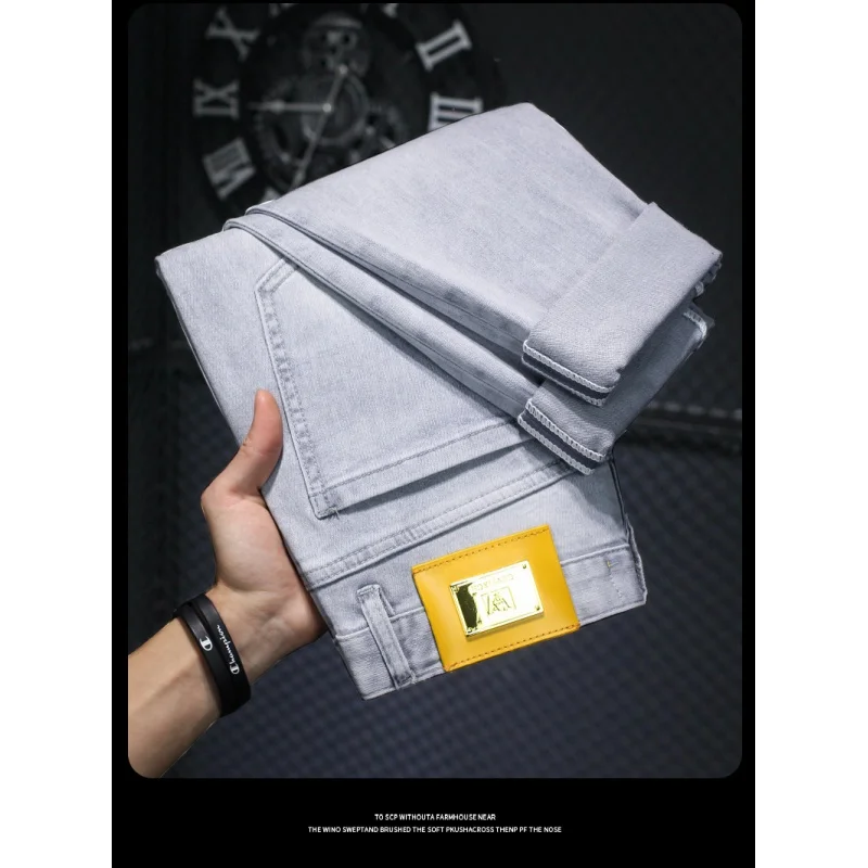 Summer thin jeans MEN'S light luxury quality high-end and fashionable simple stretch small leather tag slim fit tapered pants