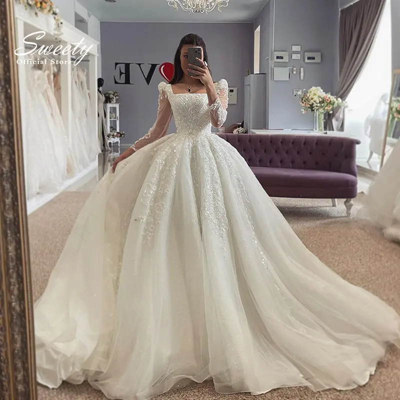 

Luxury Wedding Dress Embroidered Lace On Net With Ball Gown Train Elegant Boat Neck Full Sleeve bridal Gowns Button Robes De Ma