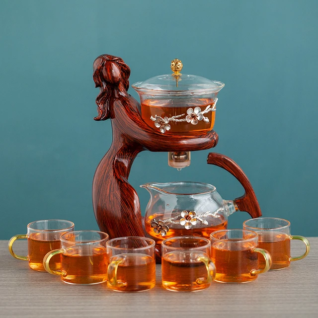 Tetera automática creativa para infusiones, juego de té de Kungfu  resistente al calor, con desviación de agua magnética, de vidrio chino
