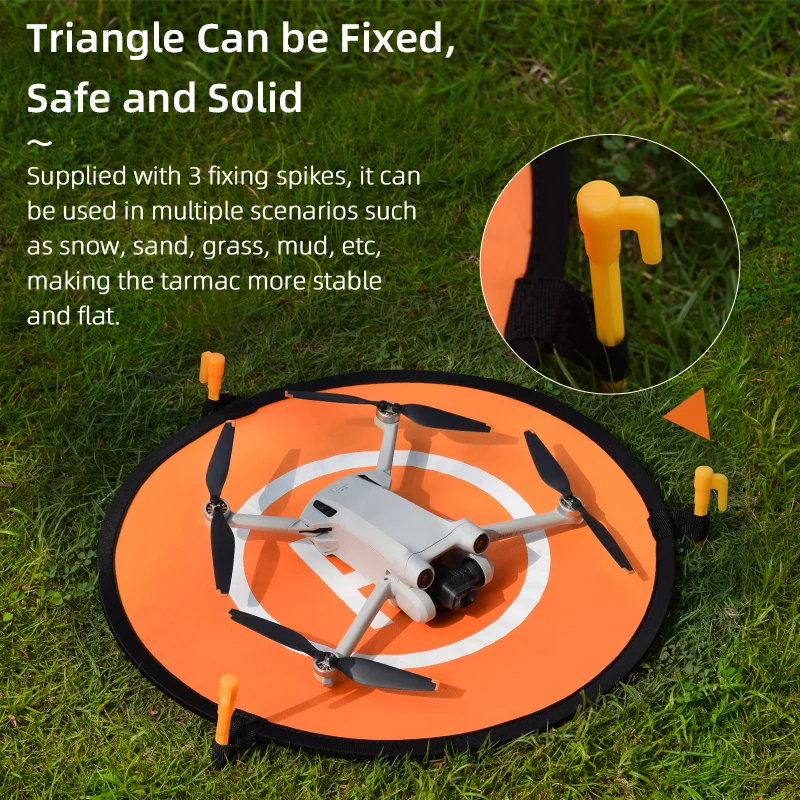 Tapis d'atterrissage pour drone plié avec poignée de transport, prêt à être rangé dans un sac