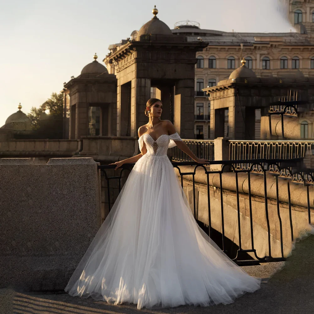 

Off Shoulder Sweetheart Wedding Dress Beaded Pearls Tulle Birdal Gown Backless Court A-line Wedding Gown vestidos de novia