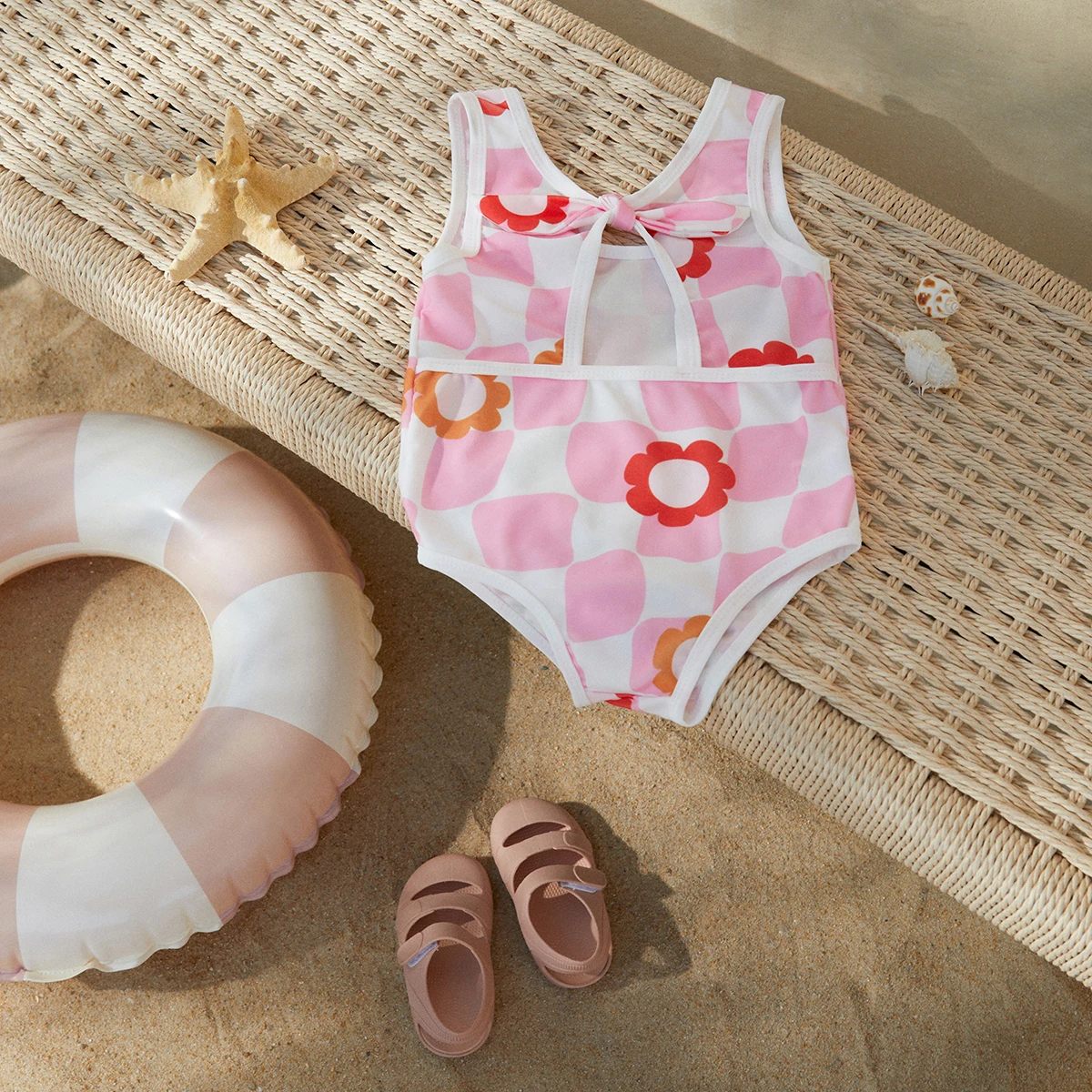 

BeQeuewll Baby Girl Swimsuits Summer Floral Print Knotted Cutout Sleeveless Jumpsuit Beachwear for Toddler Bathing Suits