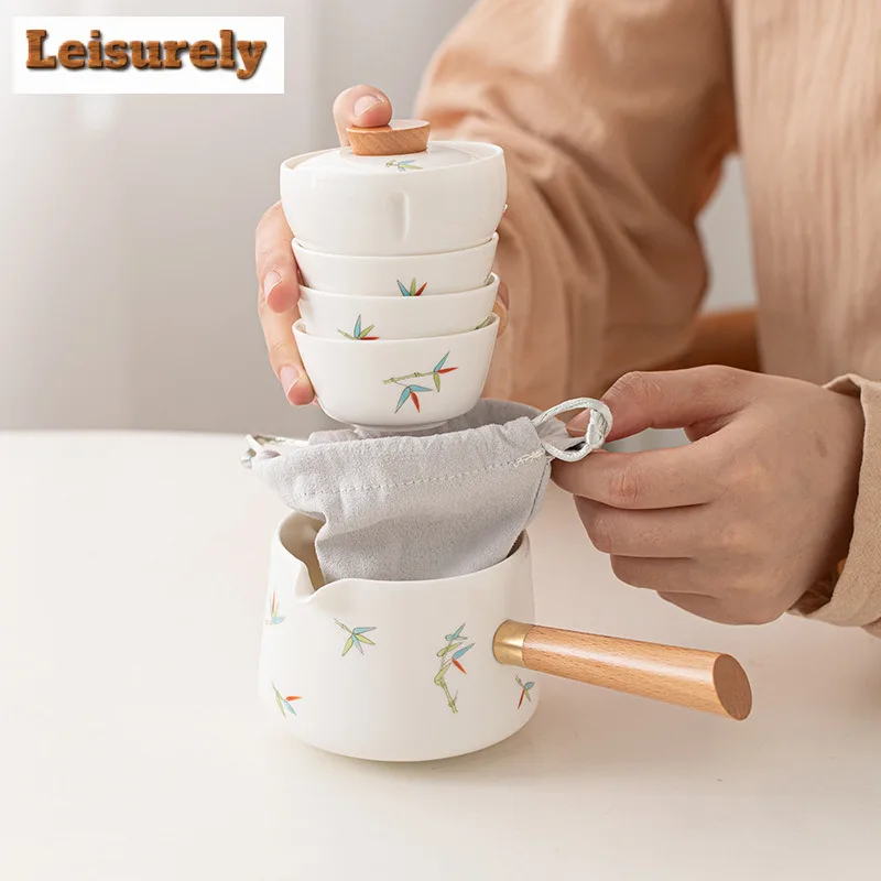 Leisurely Bamboo Ceramic Travel Tea Set Kit 360 Rotation Tea Maker Automatic Tea Set Designer 1 Pot 3 Cups Portable Picnic Bag