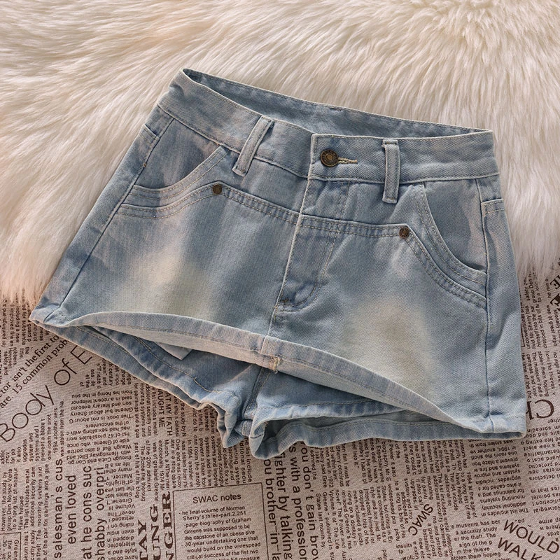 Half-body skirt pants female thin denim high-waisted design sense niche package hip a word hot girl anti-glare short skirt