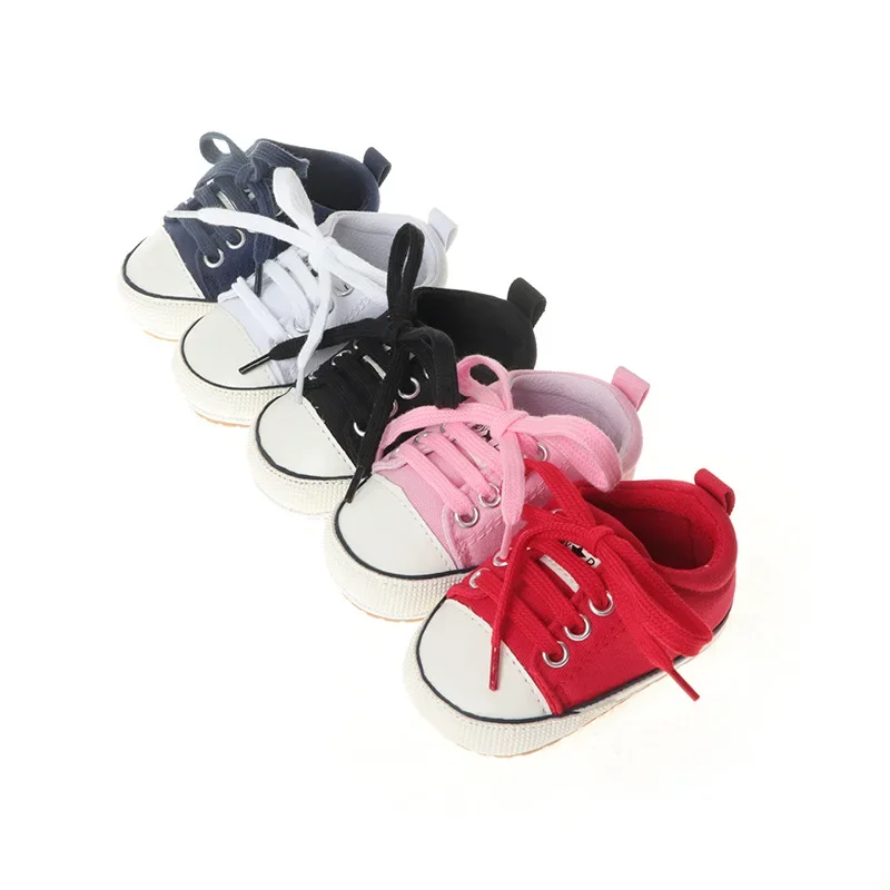 

Popular classic canvas flat baby shoes comfortable non-slip casual rubber soled baby walking shoes