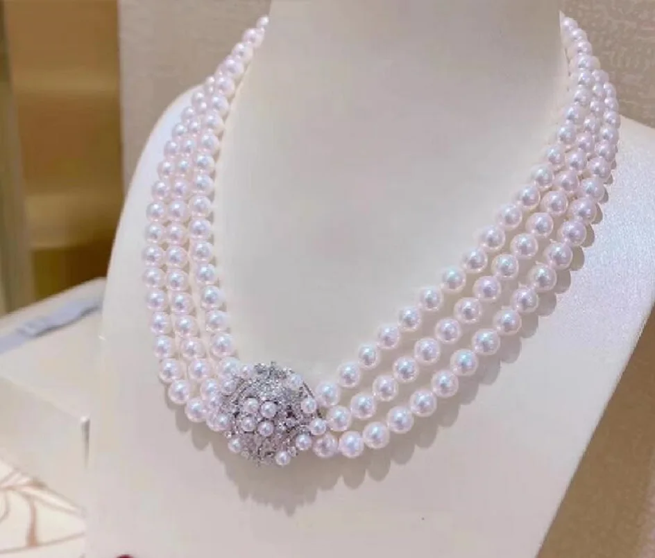 

Triple AAA 7-8mm South China Sea Round White Pearl Necklace 18 inches 925s