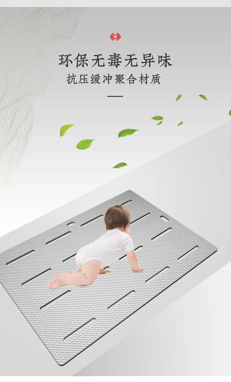 White non-slip bathroom mat with suction cups on a wet shower floor.