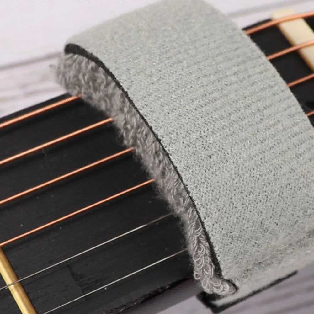 

Adjustable Tension Guitar Fret Wrap, High Elasticity, Protect Your Neck and Fingerboard, Perfect for Stringed Instruments