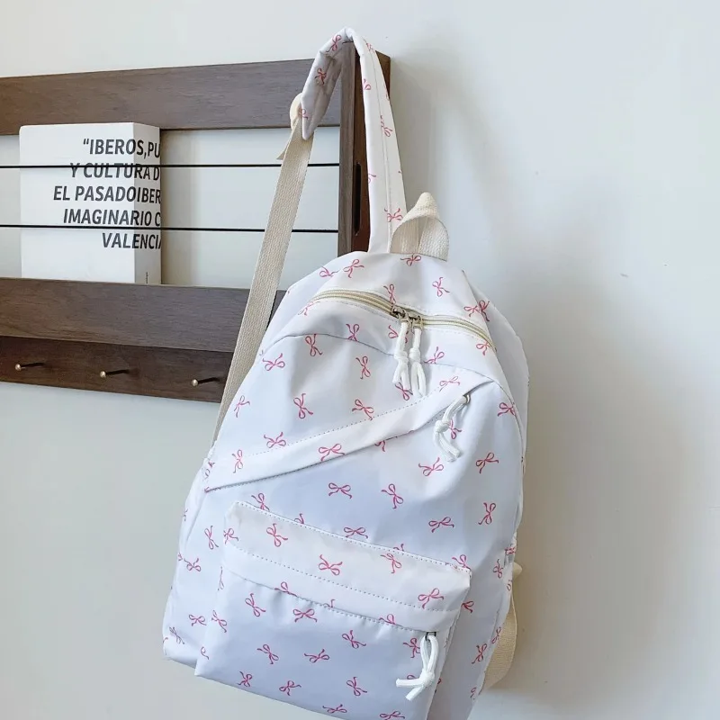 Stylish Bow Print School Backpack with Laptop Compartment and Adjustable Straps - Ideal Back-to-School Gift