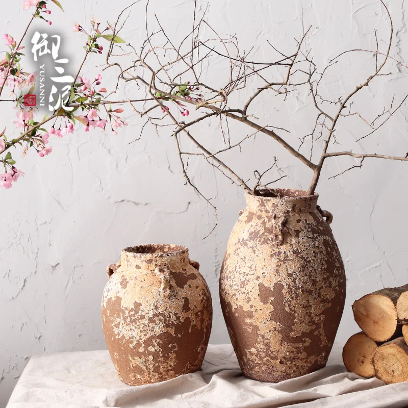 

Hand-made rough pottery vase with flowers to make old pottery jar Jingdezhen pottery dried flower