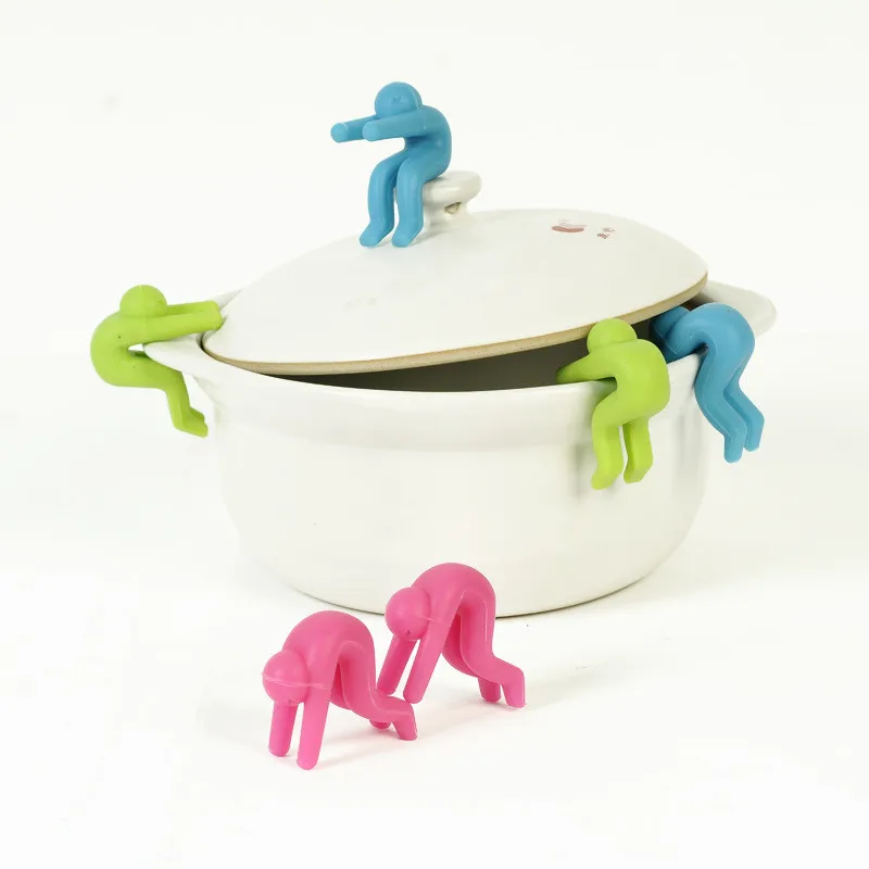 

Creative Little Man Stand Raises Pot Lid Overflow Preventer Prevents Soup From Overflowing Pot Cooking Gadget Kitchen Gadgets