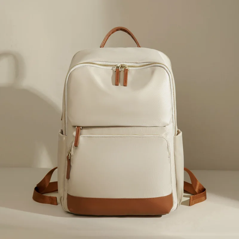 

15.6" laptop bag for women, spacious backpack for 2023, lightweight for short trips, business or school use.