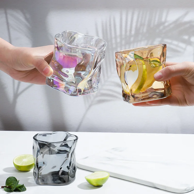 https://ae01.alicdn.com/kf/Seebe17e1fa8048129d7aee7fccd4d426m/Creative-Origami-Cup-Twist-Glass-Cup-Bar-Whiskey-Glass-Transparent-Beer-Glass-Home-Drinking-Glasses-Shot.jpg