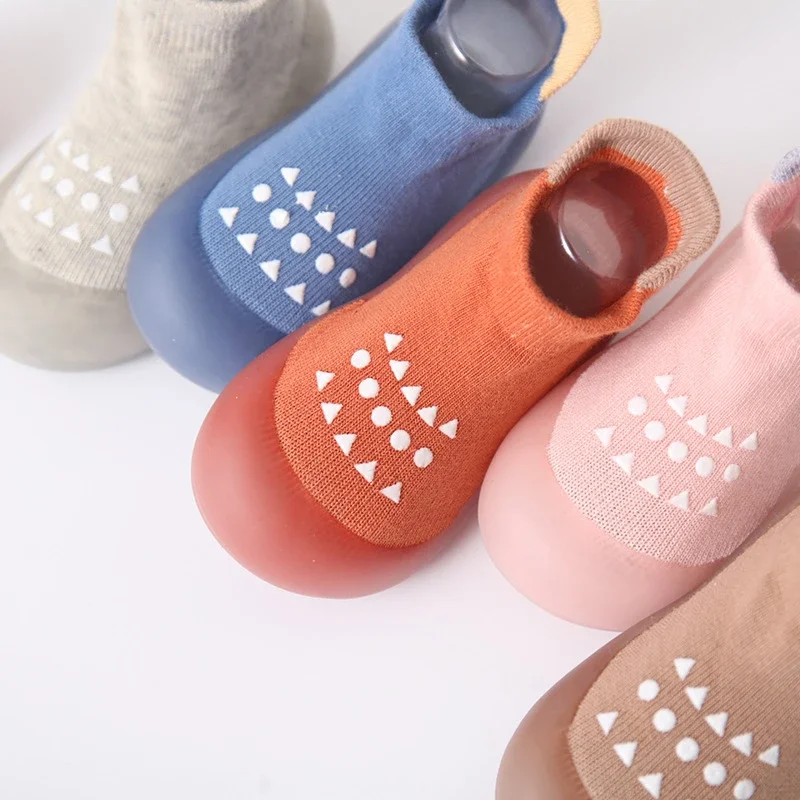 Infant booties with textured non-slip rubber sole