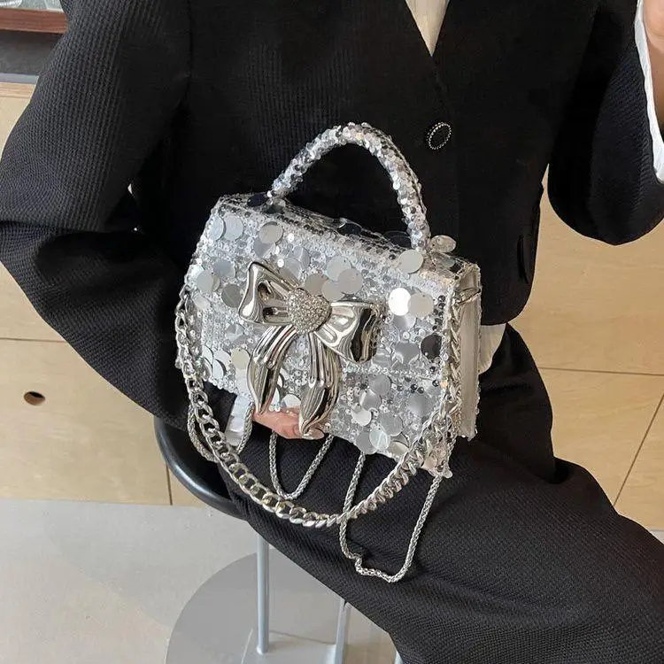thumbnail image 1 of Bolso de mano para banquetes de lujo ligero, plateado brillante, tejido irregular, con lentejuelas y lazo, bolso bandolera versátil de moda, 1 of 5