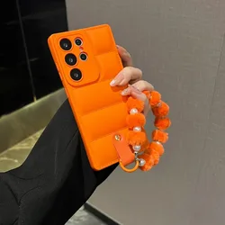 Down Jacket Style Phone Case with Plush Pearl Wrist Strap - Galaxy S23+ (Orange)