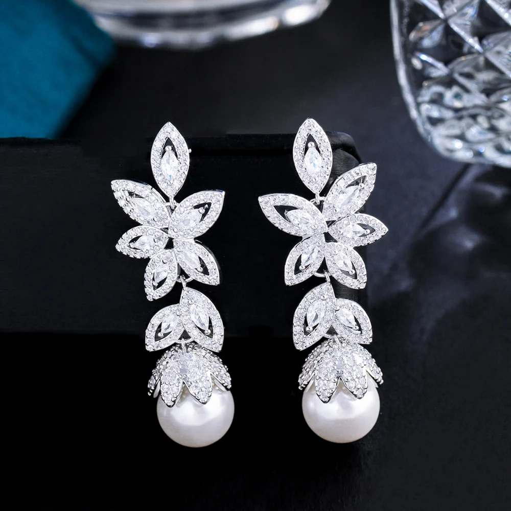 

ThreeGraces Fashion Cubic Zirconia Leaf Shape Long Dangling Simulated Pearl Drop Earrings for Women Bridal Party Jewelry E1155