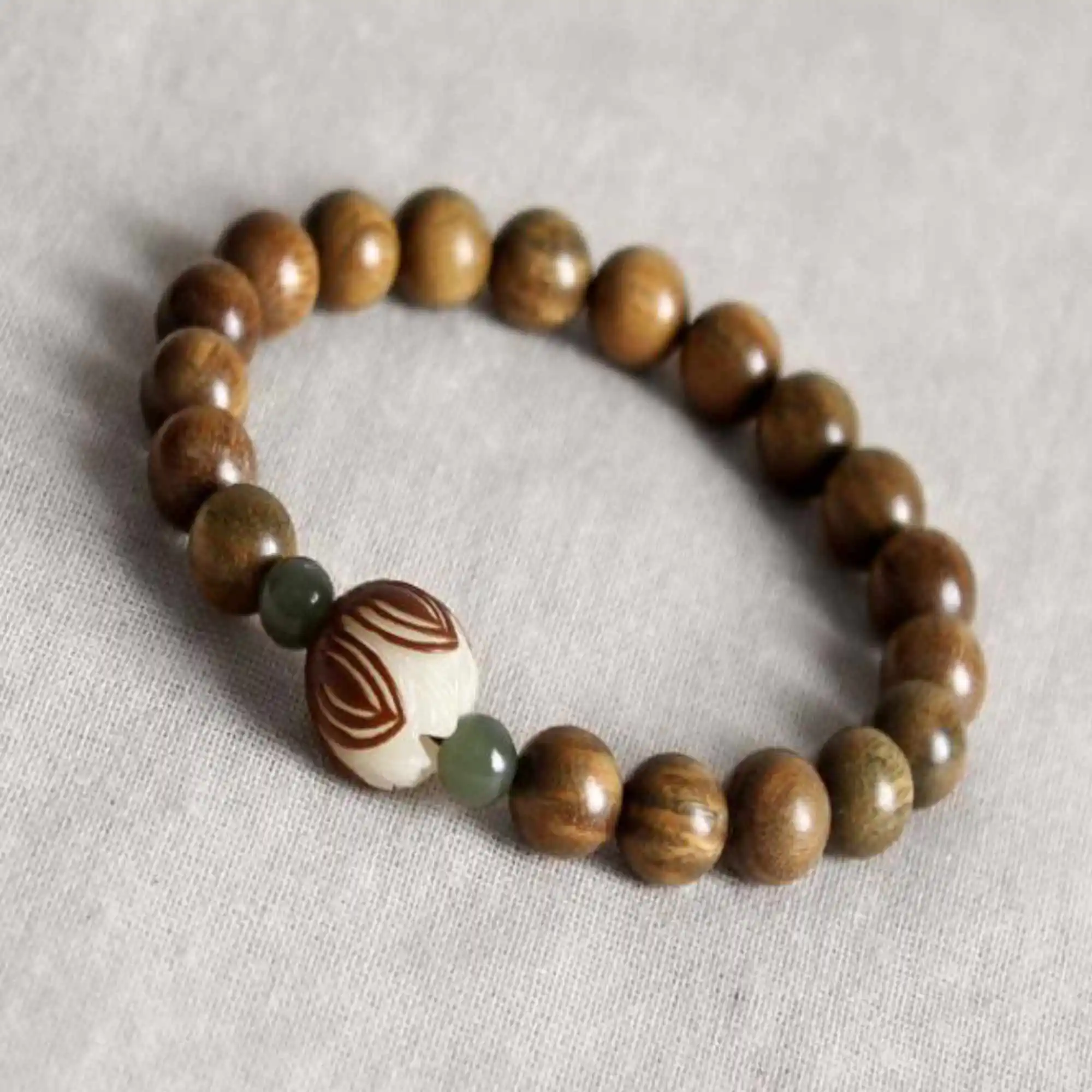 

Green sandalwood hand string men women wood simple Buddha bead Stackable Fashionistas Semi-Precious Stones Link Party Charm