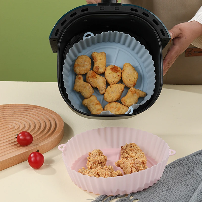 https://ae01.alicdn.com/kf/Sef130b4997fa4b539897a9827331ad1d4/Silicone-Air-Fryers-Oven-Baking-Tray-Pizza-Fried-Chicken-Airfryer-Silicone-Basket-Reusable-Airfryer-Pan-Liner.jpg