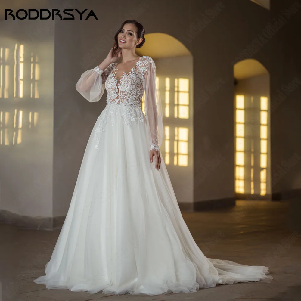 

Roddrsya Римское свадебное платье с пушистыми рукавами A - образный воротник, пряжа жилет De Novia с пуговицами, наклейка на спину свадебное платПлатье свадебное из фатина, с пышными рукавами и глубоким круглым вырезом