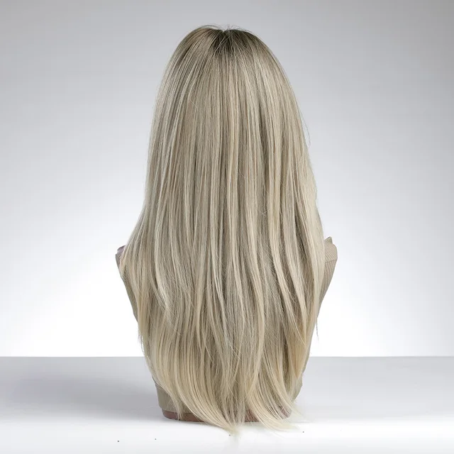 Long and straight, this high-quality synthetic wig with bangs is perfect for women who want to change up their look. It's designed to look natural and can withstand heat, making it suitable for daily wear - Image 5
