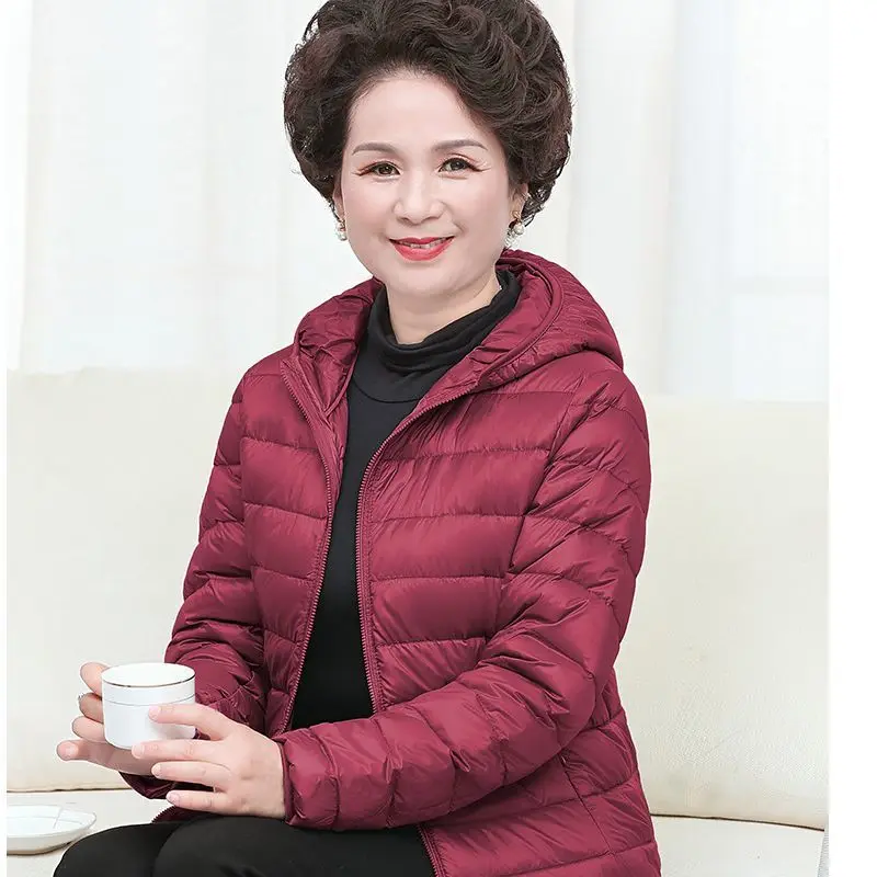 Out-of-season middle-aged and elderly women's light down jacket mother loaded with extra large size warm loose short coat fat. corduroy jacket female spring and autumn 2021 new korean version loose large size short coat middle aged mother wear top m245