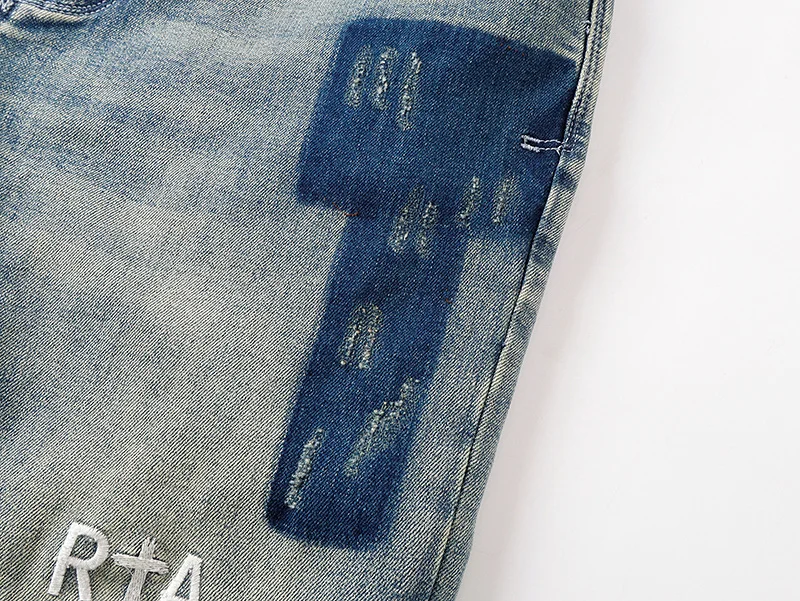 بنطلون جينز رجالي ضيق من ماركة RTA بتصميم ممزق ومزين بالرسم والجرافيتي، بنطلون طويل للشارع