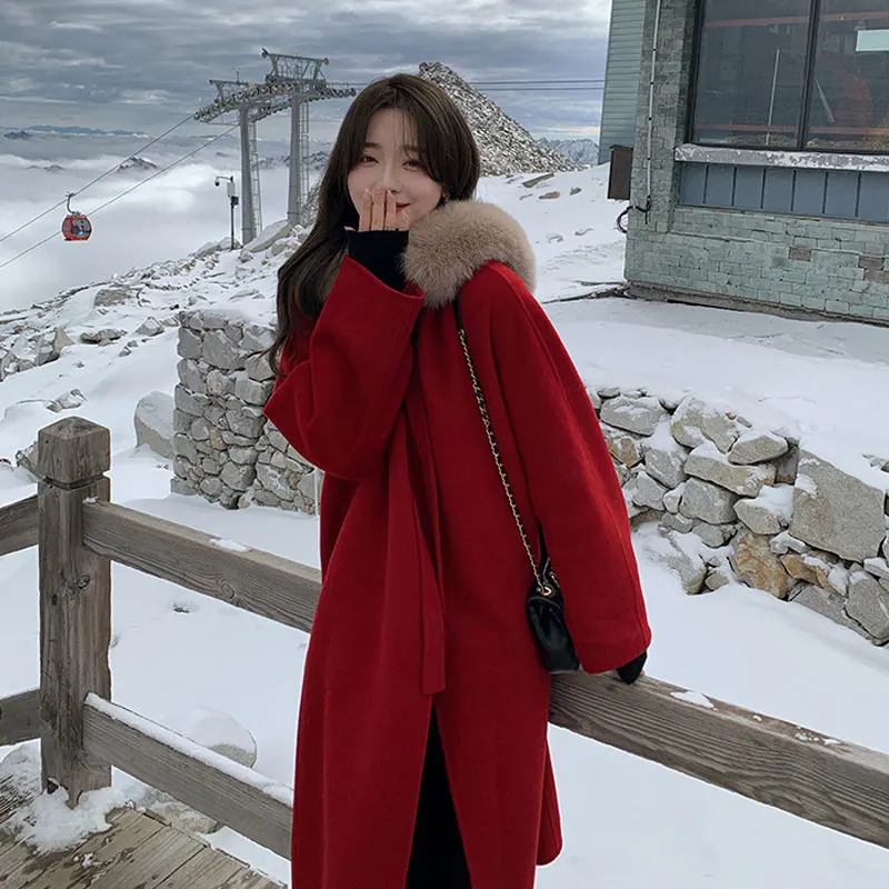 

Женское зимнее шерстяное пальто, элегантное однотонное пальто с большим меховым воротником, накидка, женские красные толстые теплые длинные пальто, Корейская верхняя одежда с капюшоном, 2023