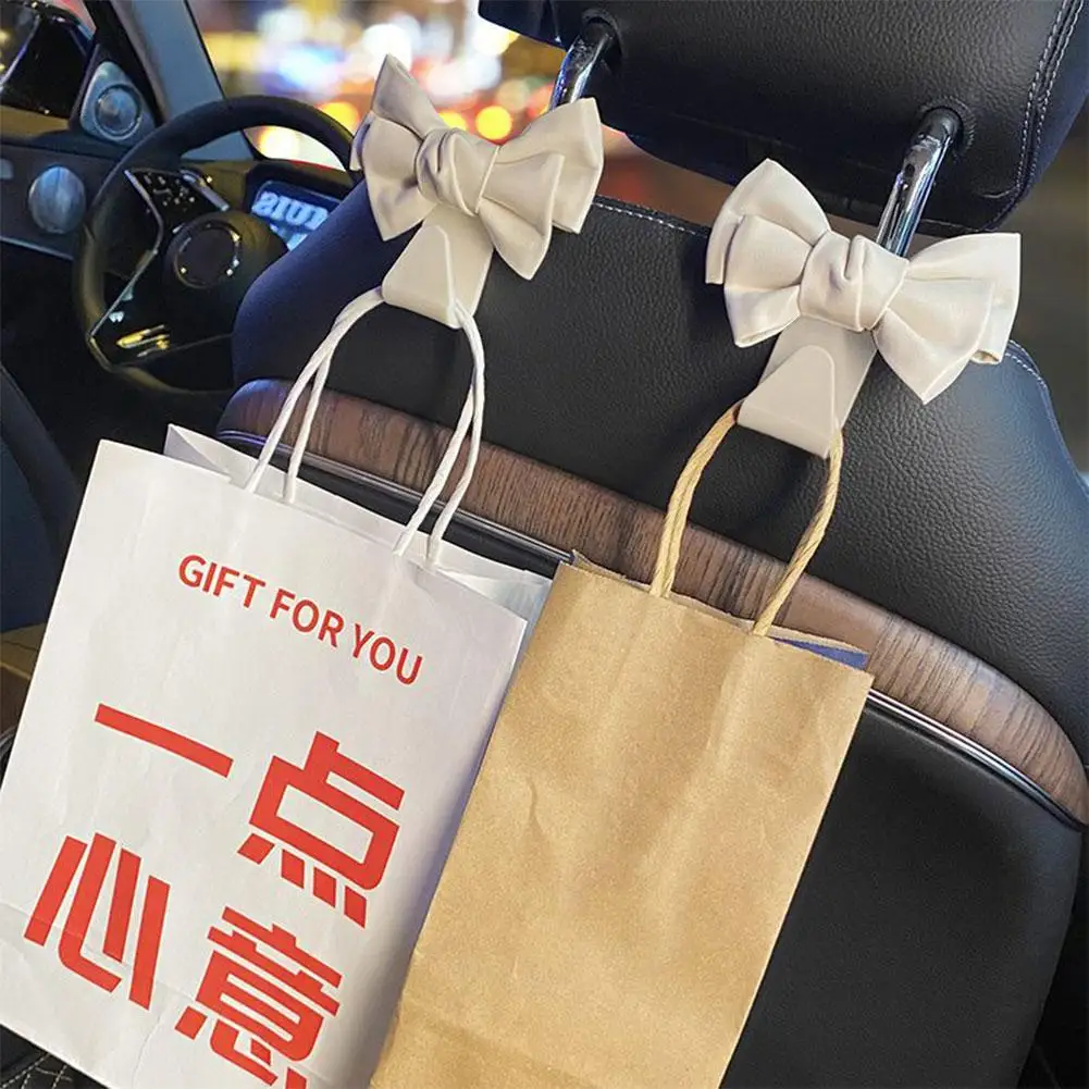 

Car Seat Back Hook Bowknot Storage Hook PU Leather Fashion Bag Purse Holder Universal Auto Fastener Clips For Car Accessori J6K4