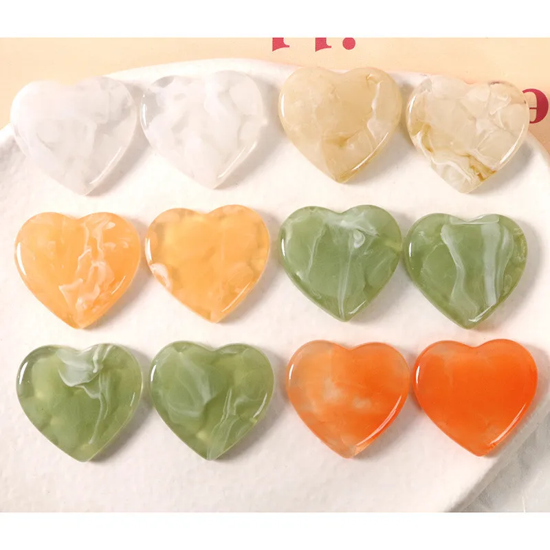 https://ae01.alicdn.com/kf/Sef604752c0f646e38ccc495bcab4e018G/Wholesale-50pcs-lot-26-24mm-color-print-cartoon-hearts-shape-resin-beads-diy-jewelry-garment-hair.jpg