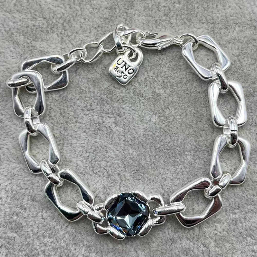 

Новинка 2023 г., распродажа, испанский очаровательный браслет unode 50 с креативным дизайном и драгоценными камнями, Женская романтическая подарочная сумочка для ювелирных изделий